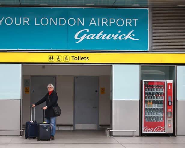 Gatwick Airport taxi drivers will protest outside a full Crawley council meeting to demand councillors do more to enforce licensing laws against Uber. Picture by Hollie Adams/Getty Images