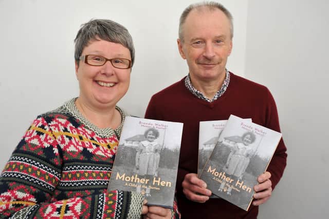 Lynette Coates and her brother Clive Walker have had a book written by their late mum published as a lasting memory to her after she died of Covid. Pic S Robards SR2211231