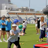 Sid the Shark keeps a close eye on youngsters having fun at last year's event | Picture: Sussex Cricket