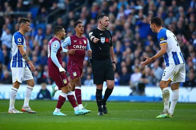 Lewis Dunk of Brighton & Hove Albion appeals to Referee, Chris Kavanagh during the Premier League match against Aston Villa