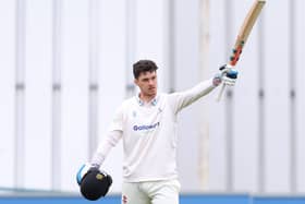 Tom Clark celebrates reaching his cenutry during the LV= Insurance County Championship match between Sussex and Nottinghamshire last April | Photo by Warren Little/Getty Images via Sussex Cricket