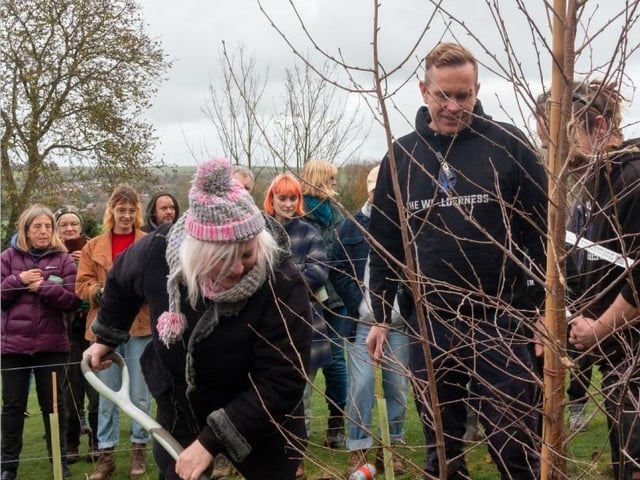 Planting the Queen’s Green Canopy Tree of Trees and 145 trees provided by South  Downs National Park at Wild Heart Hill campsite in Findon on Saturday, November 26, 2022.