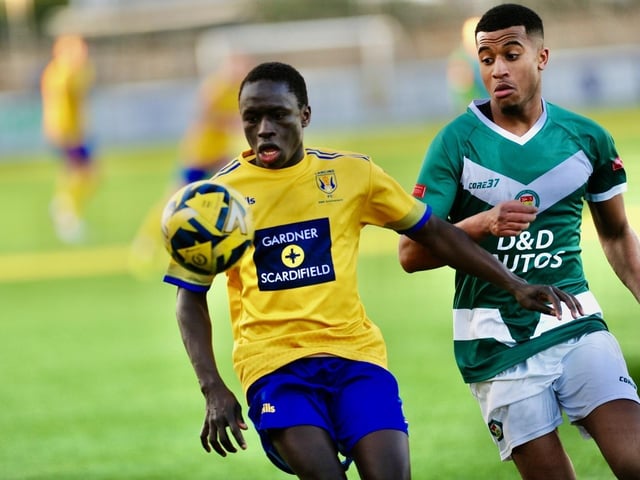 Action from Lancing's 3-2 win over Ashford United on Saturday. Picture by Stephen Goodger
