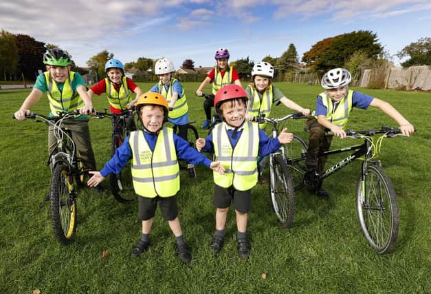 High-vis cycling jackets have been donated to Barnham Primary School