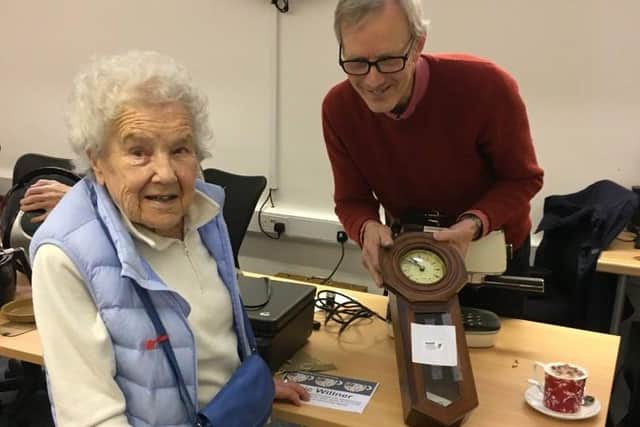 ,Eric Willner and Jennifer de Fries, who was delighted to have her clock repaired as she knows her hearing aids are working when she can hear it strike.