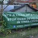 'It's a load of Ballsocks' signs are back in Vines Cross as residents say a plan for new houses would spoil the area