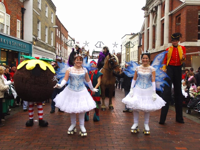 Colourful characters brightening a drab day for the 2008 festive procession