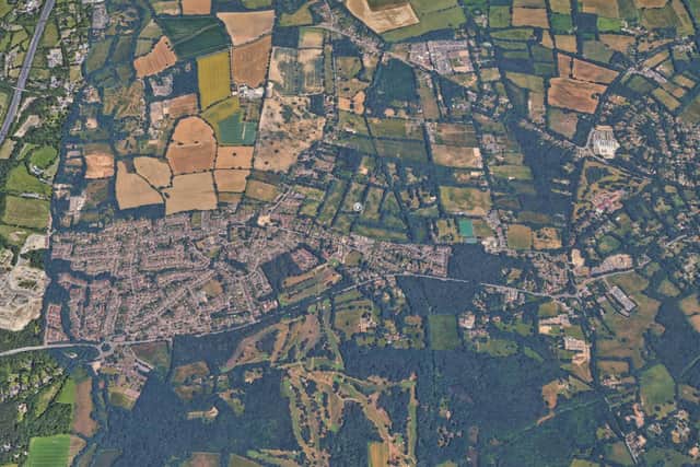 DM/26/0303: Land North Of Borers Arms Road, Copthorne. Outline planning application with all matters reserved except for access for the demolition of an existing commercial building and the erection of up to 260 dwellings, up to 1,700sqm of employment floorspace E(c)(iii), E(g)(i)(ii)(iii), car parking, landscaping, open space, and associated development works, with access from Copthorne Bank and Borers Arms Road. (Revised highway plans and supporting information received 23/07/2026.).