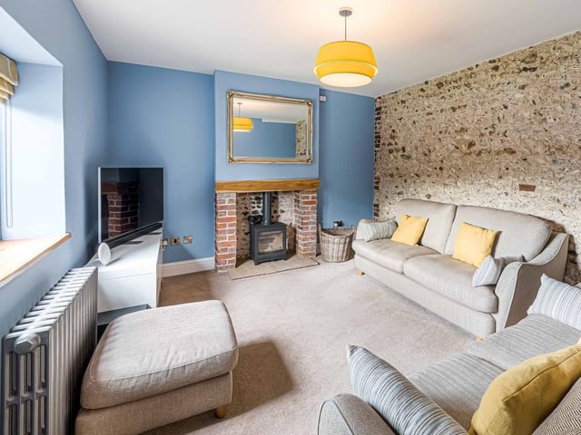 This stunning flint-and-brick detached house dates to the 1800s and used to be a pub. It was converted in about 2016 and boasts four bedrooms, three reception rooms and mature, secluded gardens.