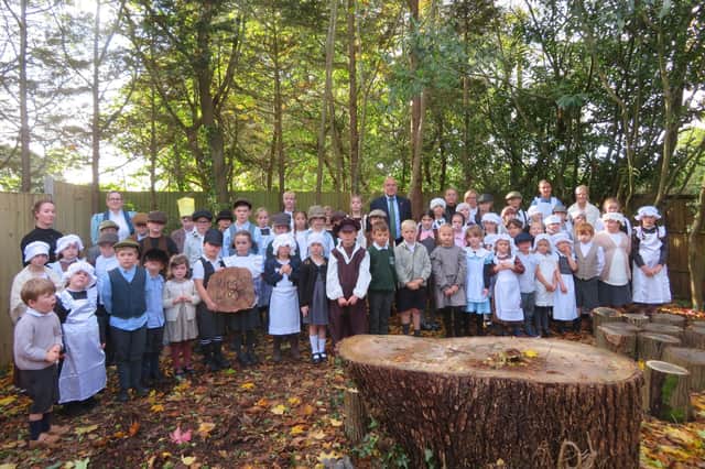 Pupils and staff dressed in Victorian costume to celebrate the 150th anniversary of Ashurst CE Primary School.
