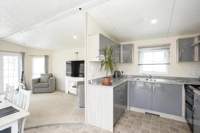 This three bedroom park home is located on the popular Lakeside Holiday Park. The accommodation provides a season length of 11.5 months a year during which time there are no restrictions on the amount of times an owner can visit their holiday home. The standard annual pitch fee for this park is from £5945 per annum.