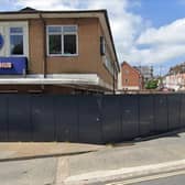 The hoarding surrounding the former bus station in Lewes. (Image via Google Maps).