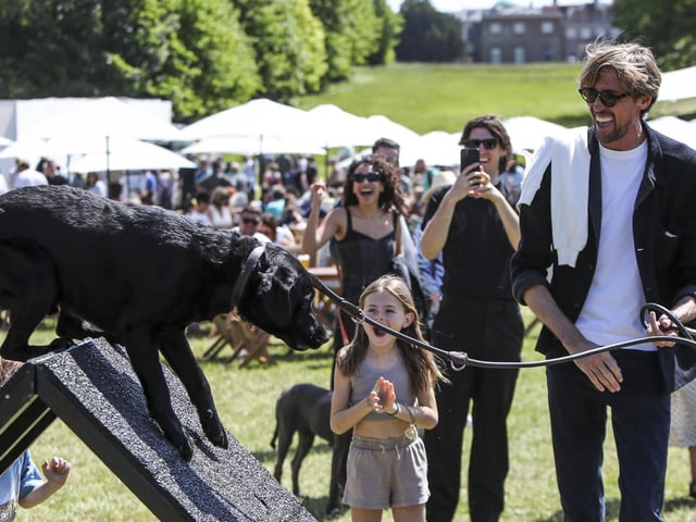 Peter Crouch and his dog enjoy Goodwoof. Photo: Kieran Cleeves, PA.
