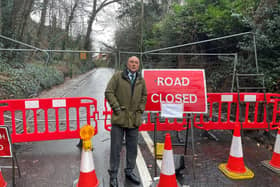 South Downs and Arundel MP Andrew Griffith inspects the scene of the  A29 closure in Pulborough following a landslide on December 28.