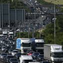 Motorists are being reminded to allow extra time or find an alternative route this weekend as work to lift the final section of a new footbridge across the M25 in Surrey takes place as a part of National Highways £317 million upgrade of junction 10, helping to connect local communities. Picture by JUSTIN TALLIS/AFP via Getty Images