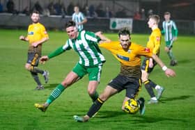 Littlehampton Town vie for the ball against Chichester City | Picture: Neil Holmes