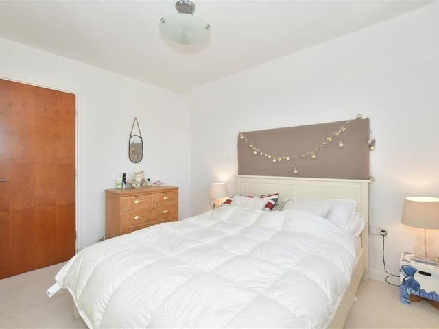 A second bedroom, with plenty of space for storage.