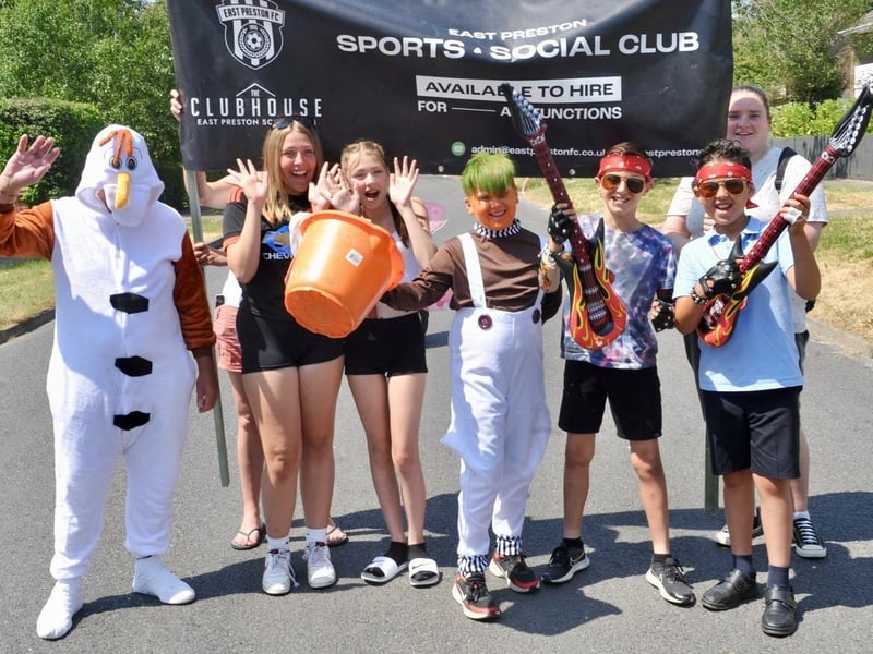 The floats and walking groups proceeded through the village in colourful and imaginative costumes with crowds of spectators lining the streets to cheer them on