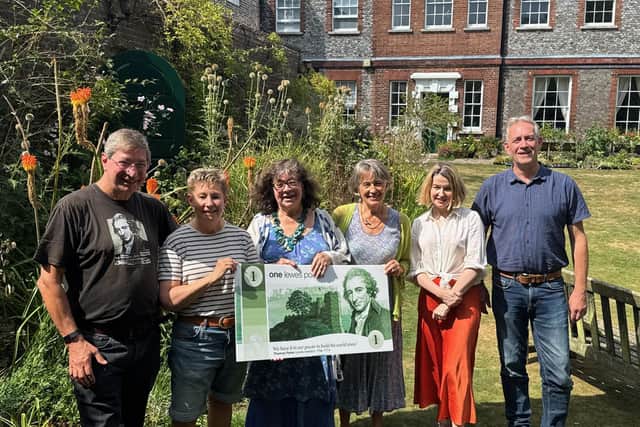 Susan Murray and Patrick Crawford (Lewes Pound) presenting donations to Sue Fleming and Juliet Oxborrow (Climate Hub), Lucie Inns (Friday Food Market) and Jon Scripps (OVESCO). Photo by Clare Crouch