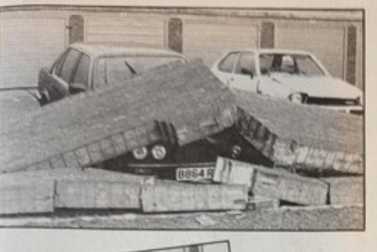 Cars covered in fallen masonry at Bexhill