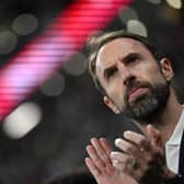 England's coach #00 Gareth Southgate applauds ahead of the Qatar 2022 World Cup Group B football match between England and USA at the Al-Bayt Stadium in Al Khor, north of Doha on November 25, 2022. (Photo by Kirill KUDRYAVTSEV / AFP) (Photo by KIRILL KUDRYAVTSEV/AFP via Getty Images)