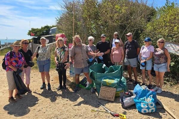 Norman Warm (centre) from BHASSEXPLORE and the Eastbourne Free Walkers. Photo: contributed