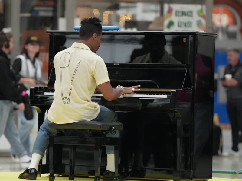 Claudia Winkleman has been pictured at Brighton railway station as her search continues to find more of the UK's most exciting amateur pianists.