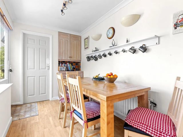 The dining room gets plenty of natural sunlight.