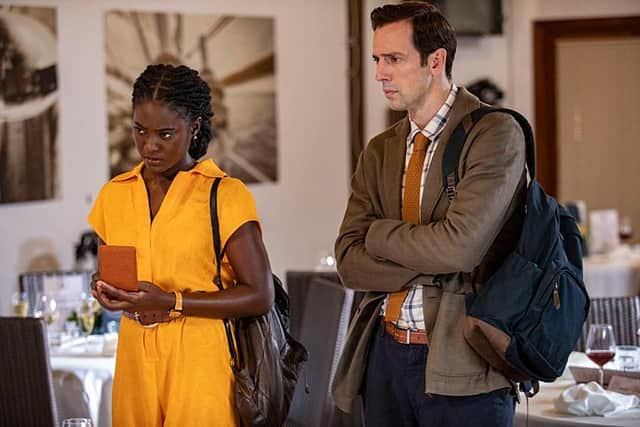Naomi Thomas (Shantol Jackson) with DI Neville Parker (Ralf Little) in the new series of Death in Paradise (Picture: BBC/Red Planet Pictures/Denis Guyenon)