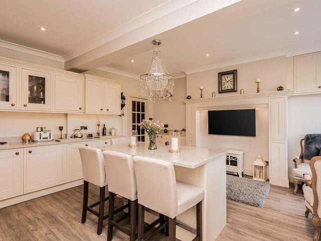 Refitted bespoke kitchen/breakfast room and utility room with integrated appliances