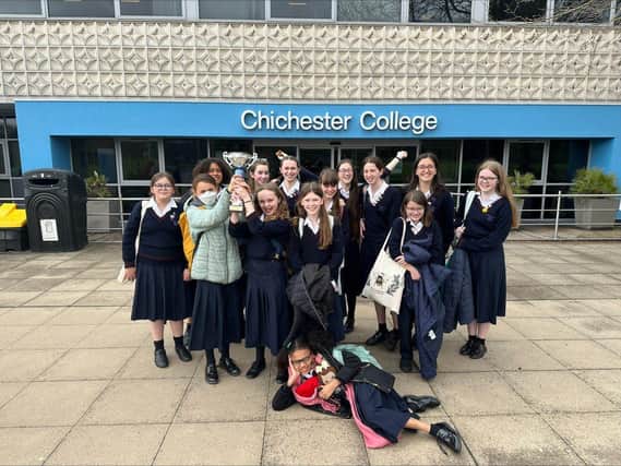The Davison CE High School for Girls students proudly show off their trophy after taking the top three spots at the interschool literature quiz!