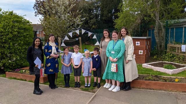 Headteacher Miss Natalie Carless, with students from St Wilfrid's Catholic Primary School, and University students Steph, Georgina, Hannah, and Haydn, ready for the ribbon cutting.