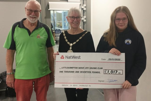 Littlehampton mayor Jill Long with Littlehampton Wave Life Saving Club chairman David Slade and member Sophia Hendey, who raised £1,017