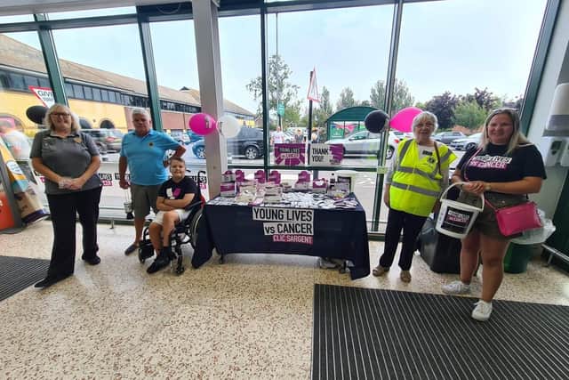Jesse Hansford was joined by his mum Nina and Littlehampton Lions Club members at Morrisons Littlehampton collecting money for Young Lives vs Cancer to mark Childhood Cancer Awareness Month