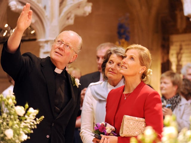 The Countess of Wessex talking to the Dean of Chichester with the Countess of Cork and Orrery, assistant flower designer
