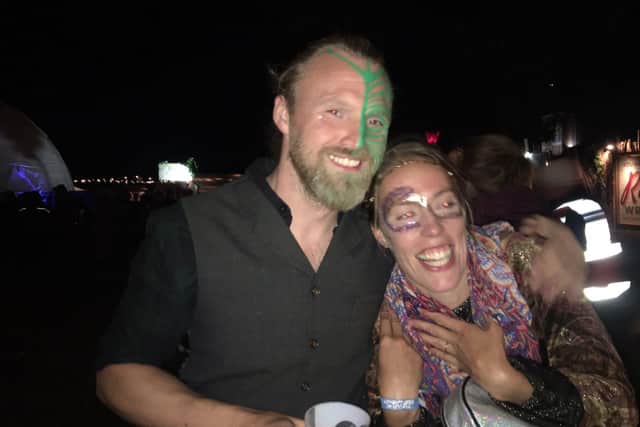 Huw with his fiancee Jess at the Shambala festival
