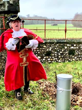 Town crier Angela Standing at the burial of the 2022 Arundel time capsule