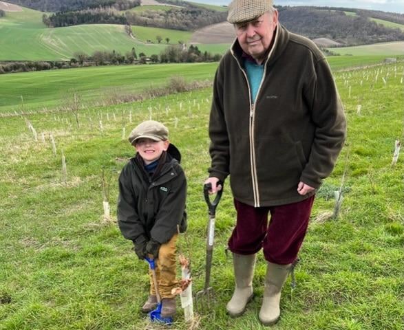 Deputy Lieutenant David Tupper and his grandson Henry at Littleton Farm, Upwaltham