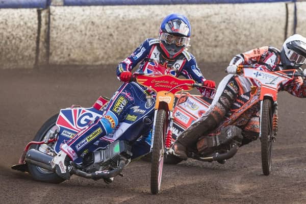 Drew Kemp (in blue) riding for Eastbourne Eagles | Picture: Mike Hinves