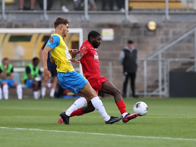 Action from Worthing's 3-0 win at Torquay United which put them top of National League South