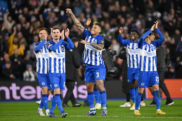 Brighton & Hove Albion celebrate with the fans after the team's victory during the UEFA Europa League match v Olympique de Marseille
