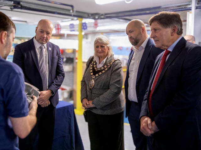 Mike Ramsey from Vent-Axia shows historic fans to (from left) Graham Sanders, managing director at Vent-Axia; the Mayor of Crawley, Councillor Marion Ayling; Peter Lamb, MP; and the Vice Lord-Lieutenant of West Sussex, John Barclay, DL