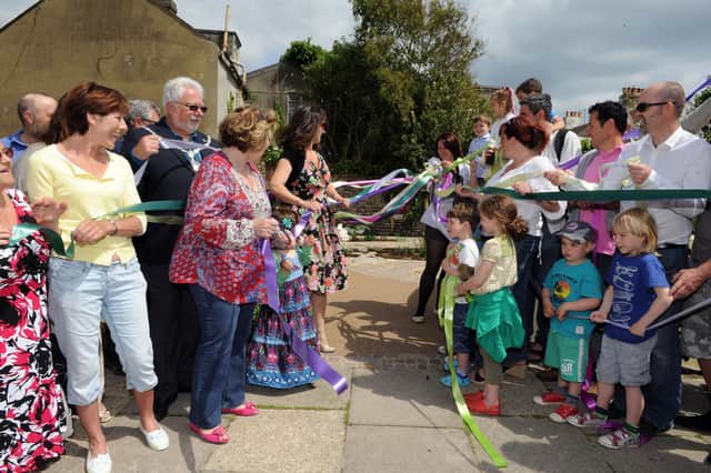 Mike Mendoza, chairman of Adur District Council in June 2013, officially opened the new sensory garden with help from supporters