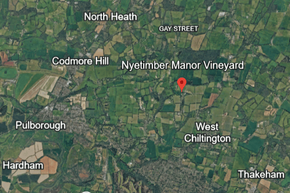 A retrospective planning application has been submitted for the use of a building as offices and parking, at a farm near Pulborough. Photo: Google Earth