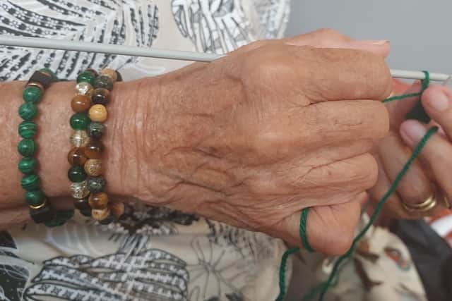 Members enjoy knitting and company at the monthly Knit & Natter group