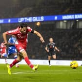 Josh Flint in recent action at Gillingham | Picture: Kyle Hemsley
