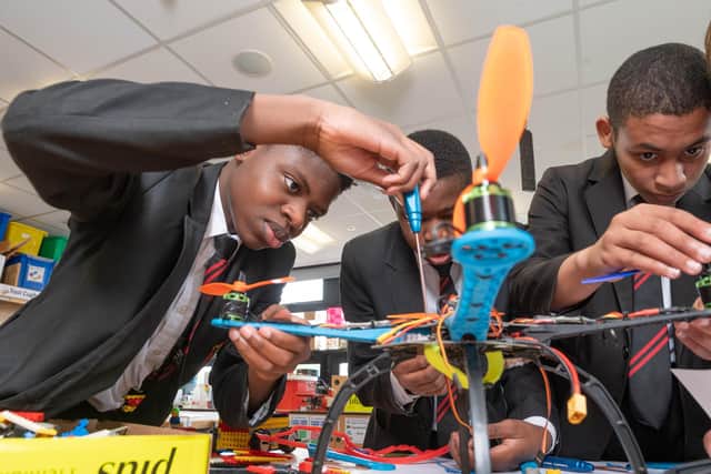 (Left to right) Students Victor, Bobade,Nagosa Obuyuwana, Ruben Almeida from Cardinal Langley RC High School take part in the Raytheon Quadcopter Challenge, Manchester. Issue date: Thursday July 1, 2021. PA Photo. Photo credit : Richard Walker/PA Wire