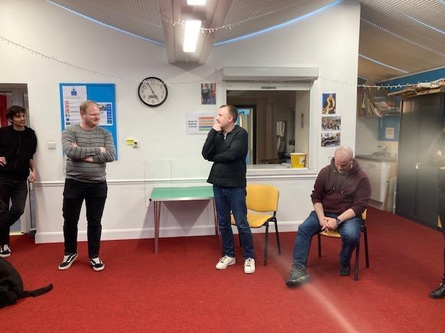Comedians Chris McCausland and Jon Long with Sight Support Worthing volunteers and members at the charity's centre in Rowlands Road