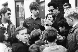 Roy Orbison signing autographs on a visit to Worthing in 1967