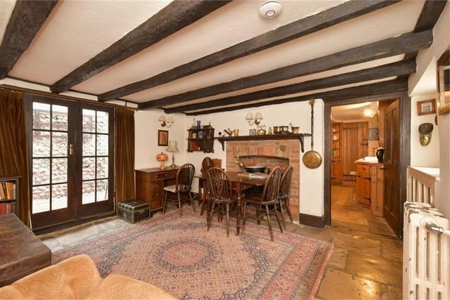 Exposed beams give the property a beautiful, rustic appearance.